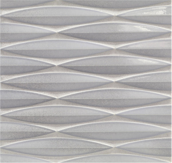 The Ka-Nu Keel 3D Mosaic Tile features a textured ceramic surface with a repeating geometric pattern of elongated diamonds in gray and white glazes, offering a modern, three-dimensional look.