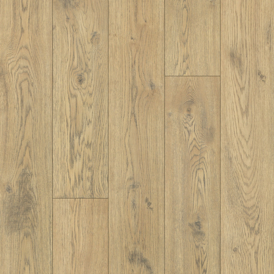 Hill Valley 7.5" Waterproof Laminate features light oak tones with natural grain, subtle variations, visible knots and lines. Arranged vertically, its smooth matte surface has an AC4 wear rating for increased durability.