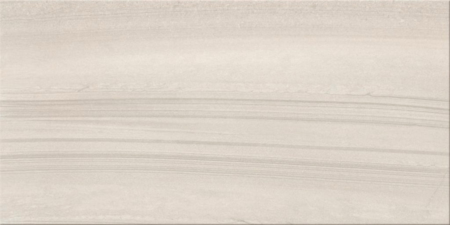 The Sandwaves 12x24 Porcelain Tile features subtle horizontal wavy lines and natural striations in a smooth beige finish, offering a minimalist and elegant look—ideal for contemporary spaces.
