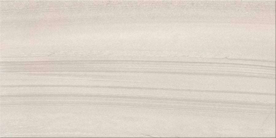 The Sandwaves 24x48 Porcelain Tile features a light beige hue with subtle horizontal striations and wavy lines, mimicking natural sandstone. Its smooth matte finish suits contemporary spaces and brings timeless sedimentary rock style to any room.